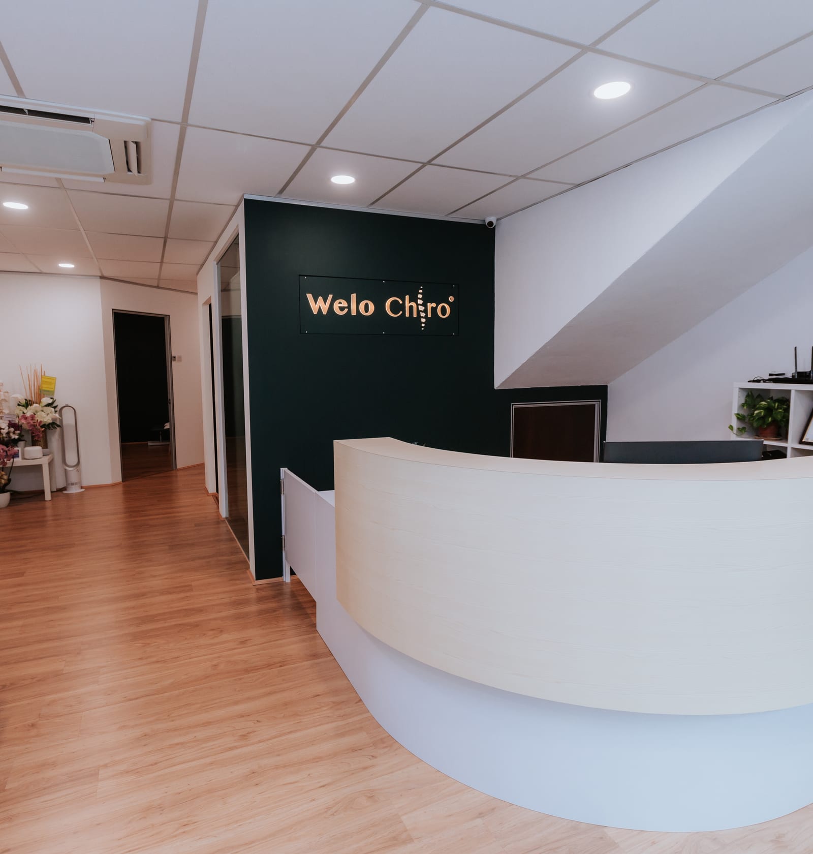 The reception at Welo Chiro Damansara Jaya, with the Welo Chiro sign behind the counter